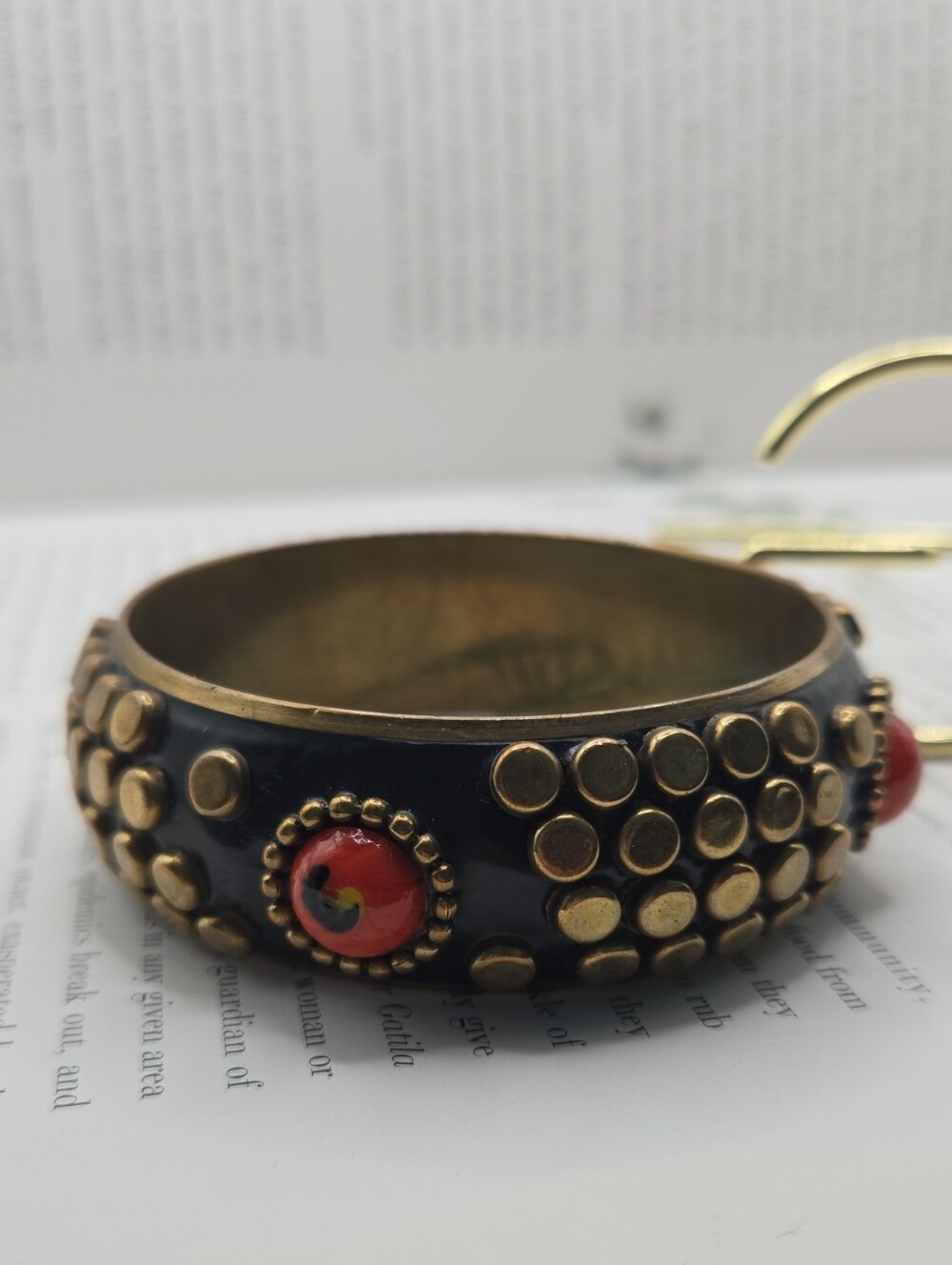 Vintage Gold-Tone Black Bangle Bracelet with Orange Accent Elements